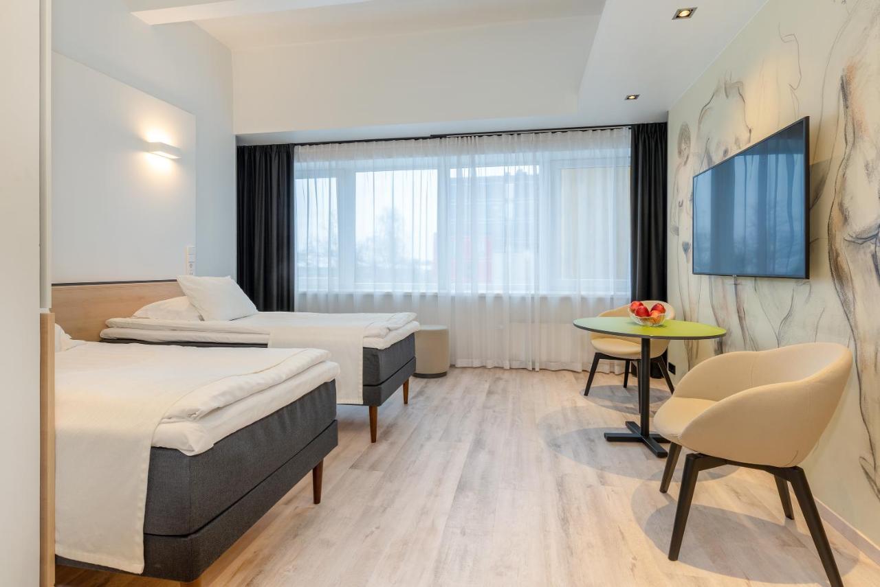 Art Hotel Pallas By Tartuhotels Bagian luar foto
